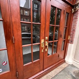Front door refinish. They worked hard to sand down imperfections and rub in the stain. Front door refinish. They worked hard to sand down imperfections and rub in the stain.