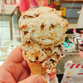 Frosty Point Ice Cream Parlor - a hand holding a cone of ice cream - Ice Cream & Frozen Yogurt Near Me - Lighthouse Point, Florida Frosty Point Ice Cream Parlor - a hand holding a cone of ice cream - Ice Cream & Frozen Yogurt Near Me - Lighthouse Point, Florida