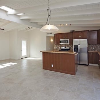 Elite Renovations - the kitchen and living room of a home - General Contractors Near Me - La Quinta, California Elite Renovations - the kitchen and living room of a home - General Contractors Near Me - La Quinta, California