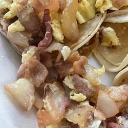 El Amigo Taqueria - Huge pieces of undercooked bacon on breakfast tacos