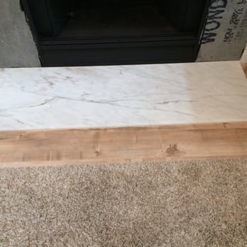 Chiarini Marble & Stone - Solid 3/4" Calacatta Marble installed for our fireplace remodel - $575 fabricated and installed! - General Contractors Near Me - Santa Ana, California Chiarini Marble & Stone - Solid 3/4" Calacatta Marble installed for our fireplace remodel - $575 fabricated and installed! - General Contractors Near Me - Santa Ana, California