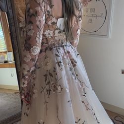 Made custom fitted sleeves for this bride. The original dress comes with puffed cap sleeves.