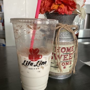 LifeLine Coffee - a cup of coffee and a vase of flowers - Coffee & Tea Near Me - Pasco, Washington LifeLine Coffee - a cup of coffee and a vase of flowers - Coffee & Tea Near Me - Pasco, Washington