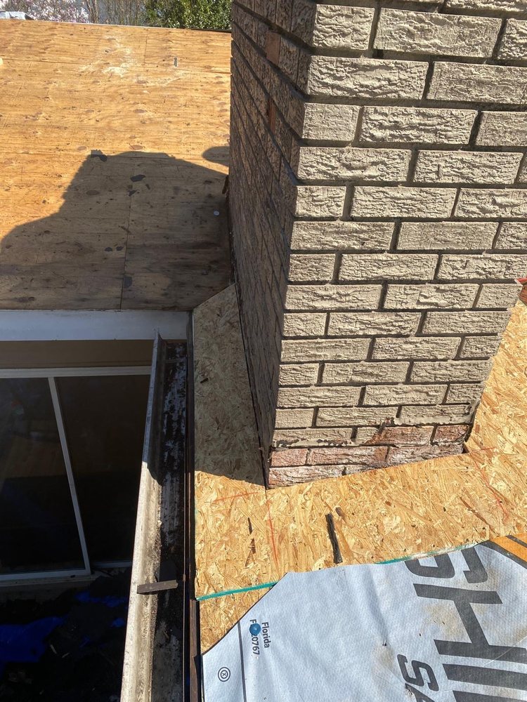 Slide of Wuilson’s Roofing