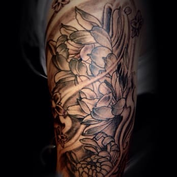 Phat Buddha Elite Tattoos - Asian flower half sleeve by Rob - Tattoo Near Me - Markham, Ontario