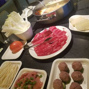 Happy Lamb Hot Pot - Just a few of the a la carte items. (Definitely recommend the house beef meatballs!) - Mongolian Near Me - Edison, New Jersey