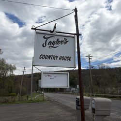 Taylor's Country House - Sign post