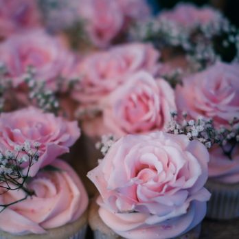 Laterna Restaurant - cupcakes with pink frosting and baby's breath flowers - Greek Near Me - Bayside, New York Laterna Restaurant - cupcakes with pink frosting and baby's breath flowers - Greek Near Me - Bayside, New York