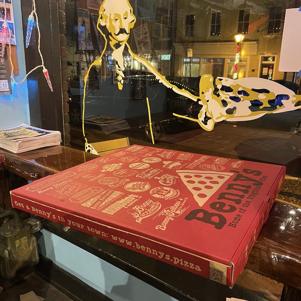 The pizza boxes are at least twice the size of a normal large box.