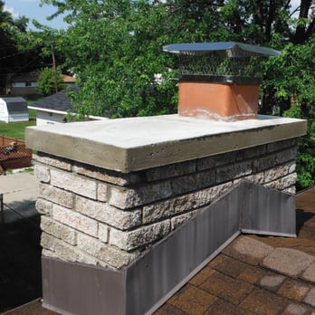 Mr Mason - a brick chimney with a chimney cap - Masonry/Concrete Near Me - Mount Clemens, Michigan Mr Mason - a brick chimney with a chimney cap - Masonry/Concrete Near Me - Mount Clemens, Michigan