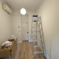 Bluebird Craft Studio - The whole room wallpaper installation for a nursery - before