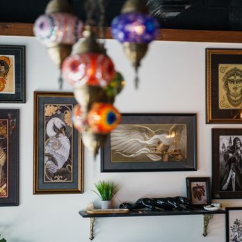 Sun & Moon Tattoo Sanctuary - shop decor - Tattoo Near Me - Wilmington, North Carolina Sun & Moon Tattoo Sanctuary - shop decor - Tattoo Near Me - Wilmington, North Carolina