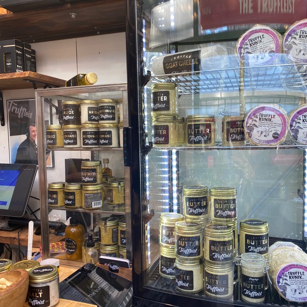 The Truffleist - a display case full of food - Street Vendors Near Me - New York, New York The Truffleist - a display case full of food - Street Vendors Near Me - New York, New York