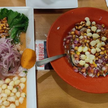 Happy Fish - Ceviche de Pescado (left) Choros a la Chalaca (right) - Peruvian Near Me - Tampa, Florida Happy Fish - Ceviche de Pescado (left) Choros a la Chalaca (right) - Peruvian Near Me - Tampa, Florida
