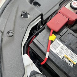 The Mobile Car Audio - Wiring went around front of engine bay and entering passenger side. Concealed well.
