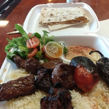 Sam's Flaming Grill - Tough dried meat, burned tomato, generic salad dressing. I didn't know jalapeno was from Lebanon. - Middle Eastern Near Me - Valencia, California