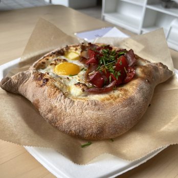 Skalka - Lobiani Boat (red beans, bacon, and pickled red chili) - Breakfast & Brunch Near Me - Seattle, Washington Skalka - Lobiani Boat (red beans, bacon, and pickled red chili) - Breakfast & Brunch Near Me - Seattle, Washington