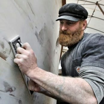 Commodore's Boats - Shipwright sanding a wooden boat - Boat Repair Near Me - Richmond, British Columbia Commodore's Boats - Shipwright sanding a wooden boat - Boat Repair Near Me - Richmond, British Columbia