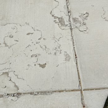 Custom Grey Concrete - The top of the patio disintegrating. This is new damage that occurred over winter. The patio is only 18 months old. - Masonry/Concrete Near Me - Denver, Colorado Custom Grey Concrete - The top of the patio disintegrating. This is new damage that occurred over winter. The patio is only 18 months old. - Masonry/Concrete Near Me - Denver, Colorado