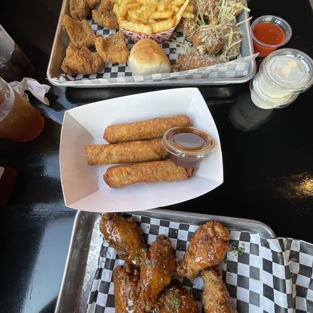 Wings and boudin egg rolls Wings and boudin egg rolls
