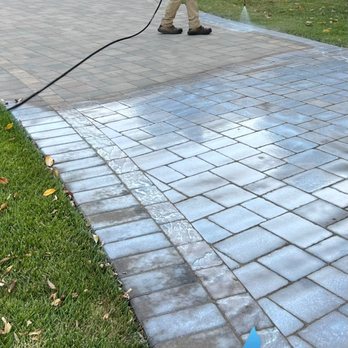 Gonzalez Scapeworks - Applying sealer to clean pavers - Pressure Washers Near Me