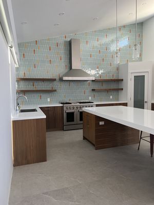 Exquisite Remodeling Logo