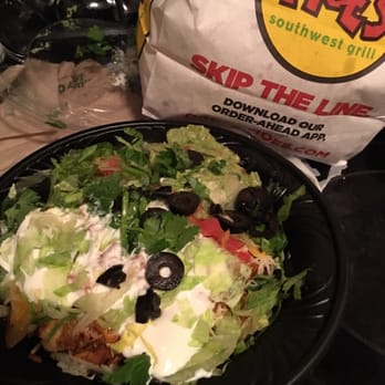 Moe's Southwest Grill - Smokin' Chicken Burrito Bowl. The top smashed the food down. - Mexican Near Me - Garner, North Carolina Moe's Southwest Grill - Smokin' Chicken Burrito Bowl. The top smashed the food down. - Mexican Near Me - Garner, North Carolina
