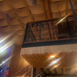 Lola Sabor y Café - Loft upstairs. Paper bag chandelier, and coffee sack ceiling. So creative