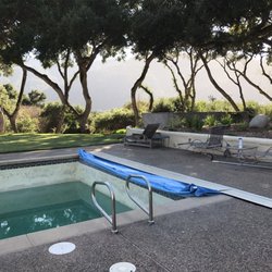 Spa Duck Specialties - In the Process of retrofitting a new Automatic Pool Cover in the Carmel Valley.