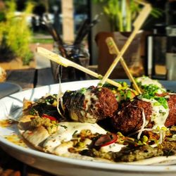 Koffie Academie Sloterdijk - Have you tried our home made beef kebabs with baba ganoush and avocado served on warm flatbread?