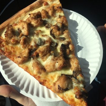 Sinapis Pizzeria - a slice of pizza on a paper plate - Pizza Near Me - Brewster, New York Sinapis Pizzeria - a slice of pizza on a paper plate - Pizza Near Me - Brewster, New York