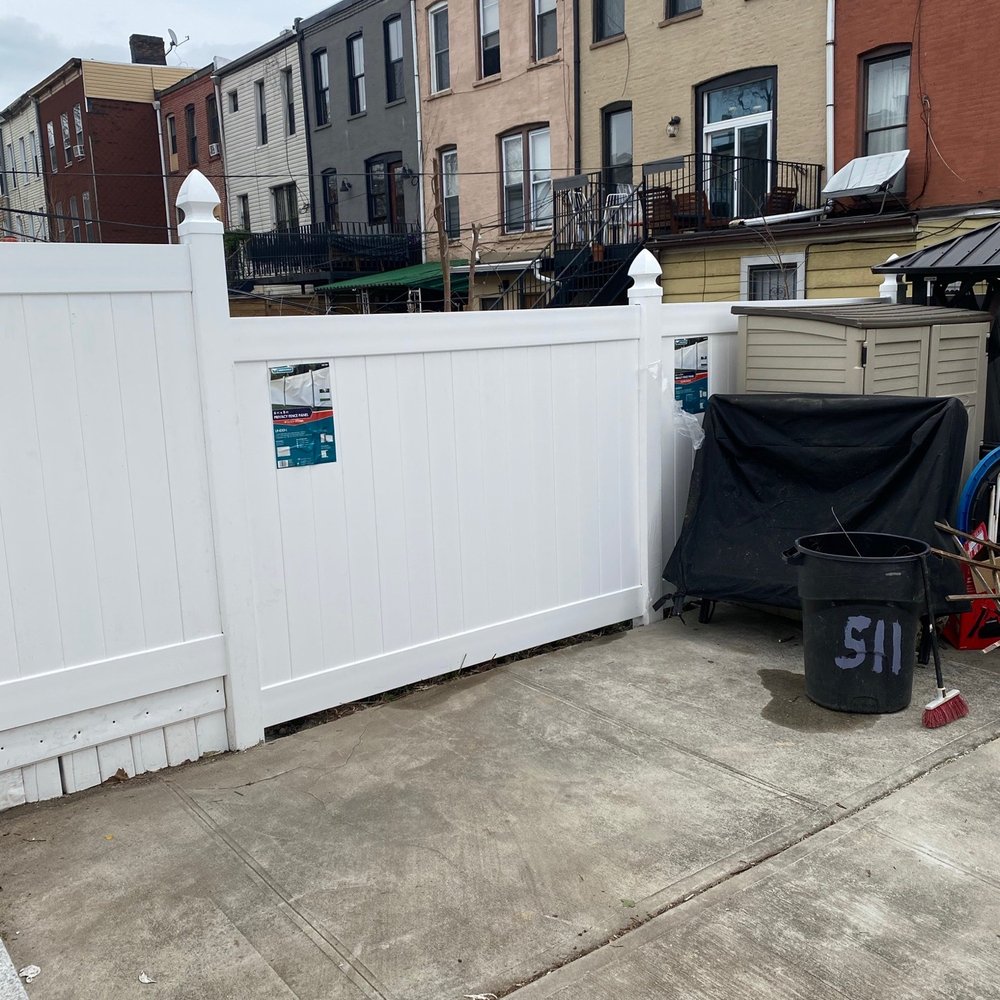 Dream Contracting - a white fence and a trash can - Masonry/Concrete Near Me - Brooklyn, New York Dream Contracting - a white fence and a trash can - Masonry/Concrete Near Me - Brooklyn, New York