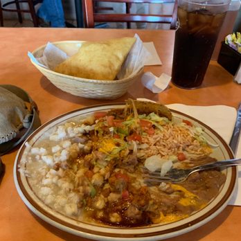 Café Castro - Combo plate- one rolled enchilada, one taco, rice, beans & posole (which was so tasty) served with fresh sopaipilla - New Mexican Cuisine Near Me - Santa Fe, New Mexico Café Castro - Combo plate- one rolled enchilada, one taco, rice, beans & posole (which was so tasty) served with fresh sopaipilla - New Mexican Cuisine Near Me - Santa Fe, New Mexico