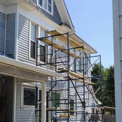Affordable Construction - New siding and exterior paint