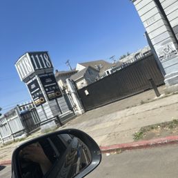 Photo of outside with closed gates during business hours