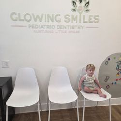 Glowing Smiles Pediatric Dentistry - He loves the toys and books in the waiting room.