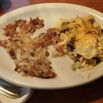 Holman's Restaurant - 9 dollar scramble. Not pictured- pool of water under eggs. - Dive Bars Near Me - Portland, Oregon Holman's Restaurant - 9 dollar scramble. Not pictured- pool of water under eggs. - Dive Bars Near Me - Portland, Oregon