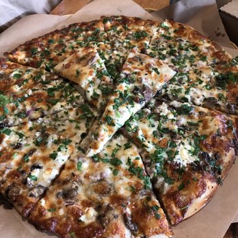 Cheese Board Pizza - Mozarella, Capricho De Cabra (goat cheese), Garlic Olive Oil, Oregano, Parsley, Red Onion, and Mushroom - 12/22/17 - Pizza Near Me - Berkeley, California Cheese Board Pizza - Mozarella, Capricho De Cabra (goat cheese), Garlic Olive Oil, Oregano, Parsley, Red Onion, and Mushroom - 12/22/17 - Pizza Near Me - Berkeley, California
