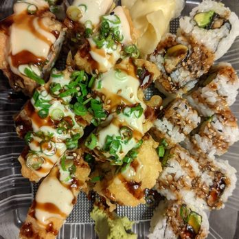 Sushi By The Bay - Monterey (left) and Eel Avocado (right) - Sushi Bars Near Me - Monterey, California Sushi By The Bay - Monterey (left) and Eel Avocado (right) - Sushi Bars Near Me - Monterey, California
