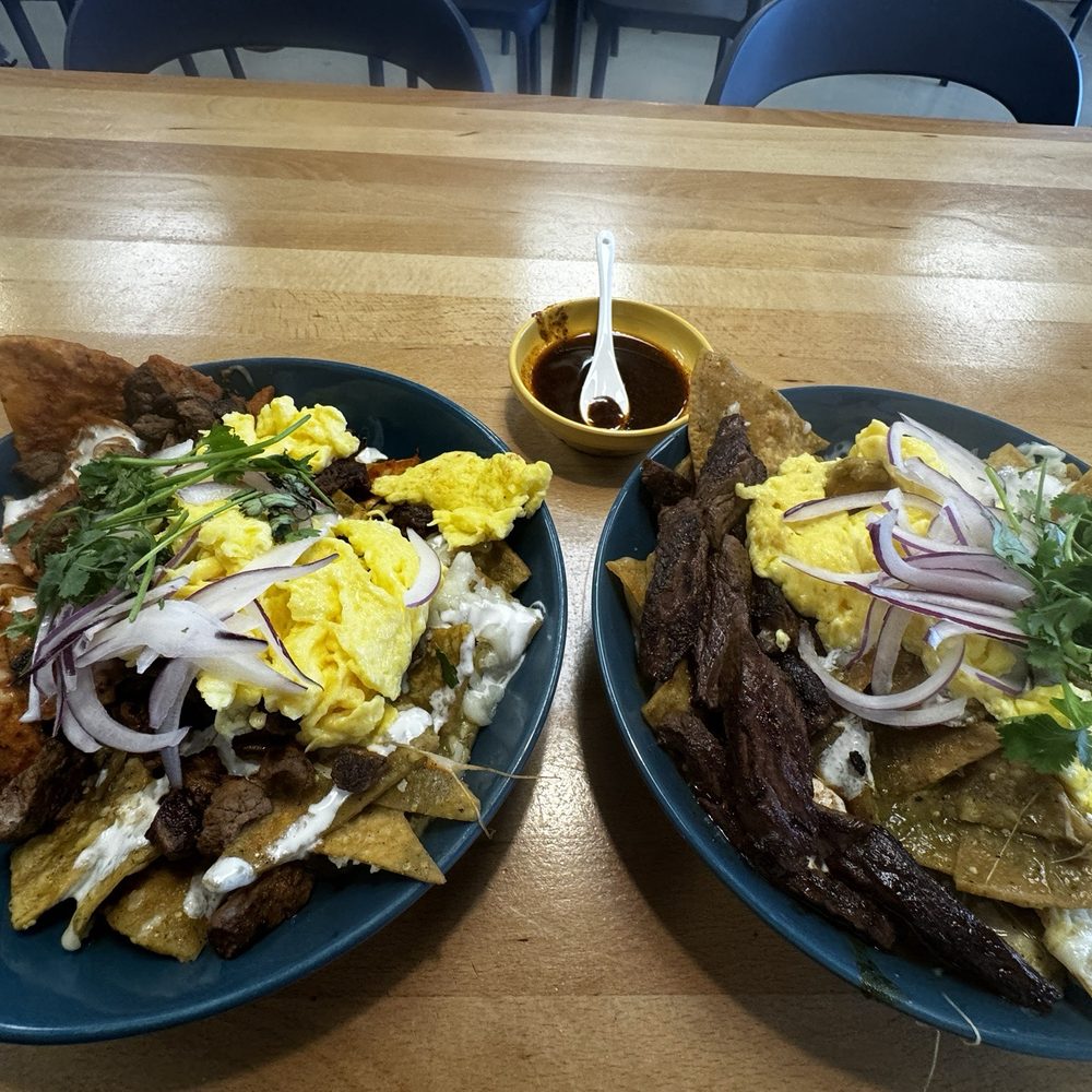 SeD Cocina - Chilaquiles verdes y chilaquiles divorciados which is red and green sauce. - Mexican Near Me - Montclair, California SeD Cocina - Chilaquiles verdes y chilaquiles divorciados which is red and green sauce. - Mexican Near Me - Montclair, California