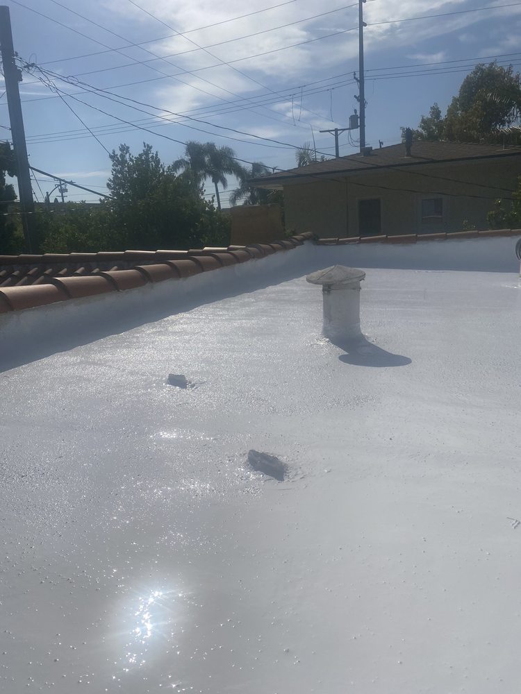 Slide of Adams Roofing