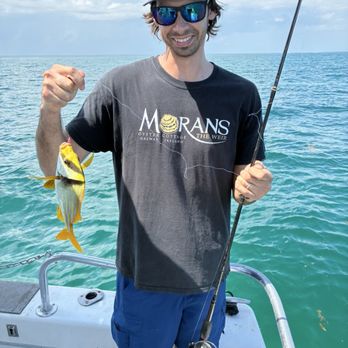 Sea Dog Charters - Fisherman with porkfish - Boating Near Me - Marathon, Florida Sea Dog Charters - Fisherman with porkfish - Boating Near Me - Marathon, Florida