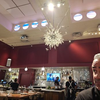 Sofia - Chandelier made of broken plates and cutlery. - Italian Near Me - New Orleans, Louisiana