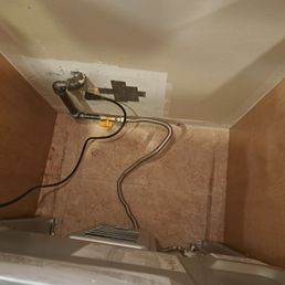 New plumbing, routed perfectly based on new oven back panel configuration to ensure oven can be pushed up against the wall.