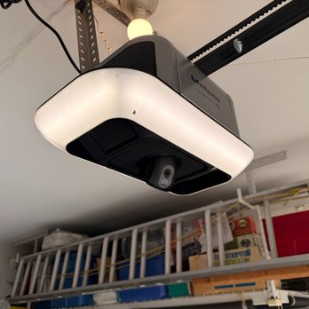 Third Gen Garage Doors - Ceiling-mounted garage door opener installed in a residential garage in Palatine, Illinois. - Garage Door Services Near Me Third Gen Garage Doors - Ceiling-mounted garage door opener installed in a residential garage in Palatine, Illinois. - Garage Door Services Near Me