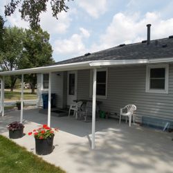 Advance Aluminum Supply Inc - Insulated patio roof with support posts