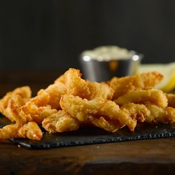 Long John Silver's - a pile of fried onion rings - Seafood Near Me - Clinton, Arkansas Long John Silver's - a pile of fried onion rings - Seafood Near Me - Clinton, Arkansas