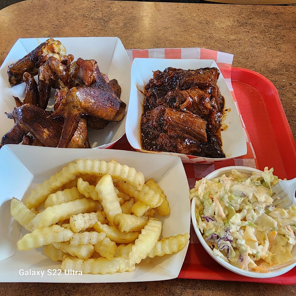 Burnt ends, smoked wings, fries, Cajun slaw
