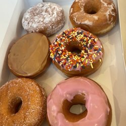 Dunkin' - Half dozen sugared, maple Vanilla cream, strawberry glazed, strawberry with sprinkles, powdered jelly & classic glazed