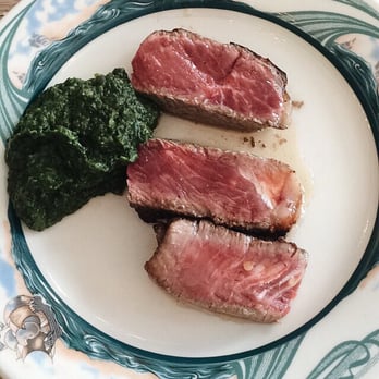 Peter Luger - Steak cooked rare w/ creamed spinach - Steakhouses Near Me - Brooklyn, New York Peter Luger - Steak cooked rare w/ creamed spinach - Steakhouses Near Me - Brooklyn, New York